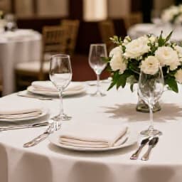 Elegant wedding reception venue in San Francisco with beautifully set tables and floral decor. A sophisticated setting for unforgettable wedding celebrations, showcasing meticulous event handling and comprehensive wedding packages.