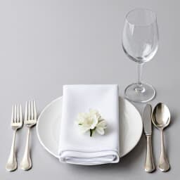 Elegant wedding reception table setting at Beluga Banquet Hall San Francisco. Beautifully decorated tables with floral centerpieces and fine dining arrangements, setting a sophisticated tone for a dream wedding.