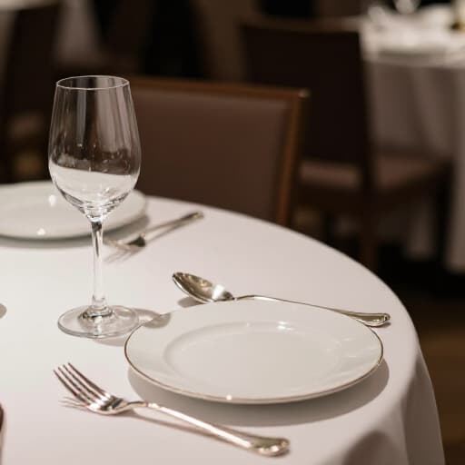 Elegant event dining setup at Beluga Restaurant & Banquet Hall. A beautifully set table in a grand banquet hall, ready for a special celebration in San Francisco.