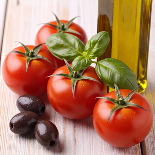 Fresh and Healthy Mediterranean Cuisine. A vibrant display of Mediterranean dishes featuring fresh vegetables, olive oil, and herbs, highlighting the healthy and flavorful diet.