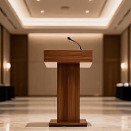 Elegant corporate event setup in San Francisco banquet hall. A professionally arranged venue with formal dining tables, lighting, and stage, perfect for business gatherings and San Francisco corporate events.